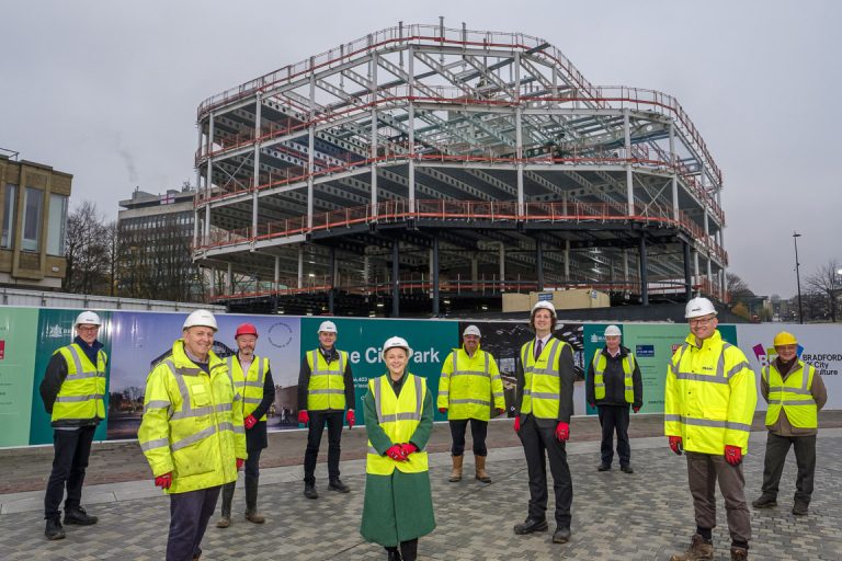 Bradford’s landmark One City Park office scheme lights up to mark topping out