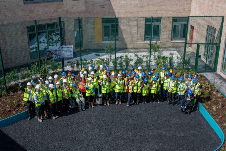 Historic moment for Manchester as time capsule is buried at brand-new mental health unit construction site