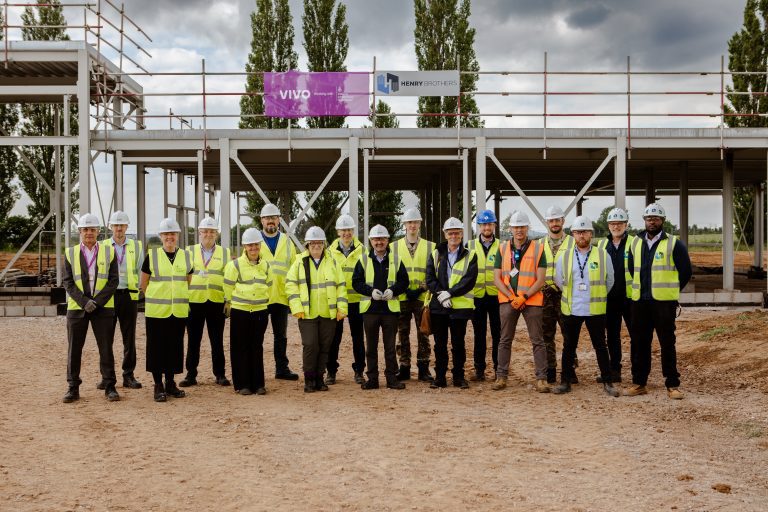 Henry Brothers and VIVO Defence stage topping out ceremony at Gamecock Barracks