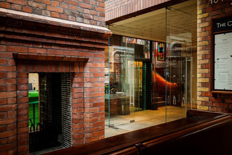 A perfect fit for a modern glass lift: Combining accessibility with historical elegance