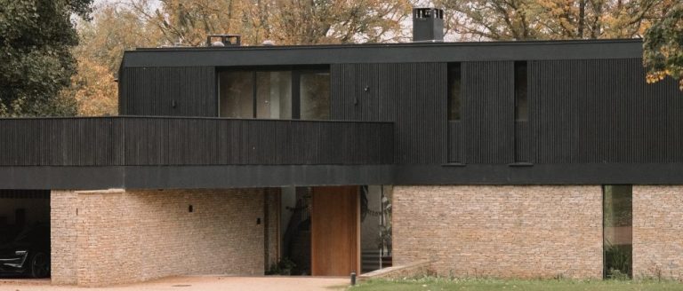 Heat-Treated and Charred Timber in Contemporary Architecture: Performance, Aesthetics and Regulatory Integration