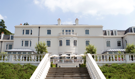 Haddonstone's balustrade lines a stairway at Coworth Park, Ascot