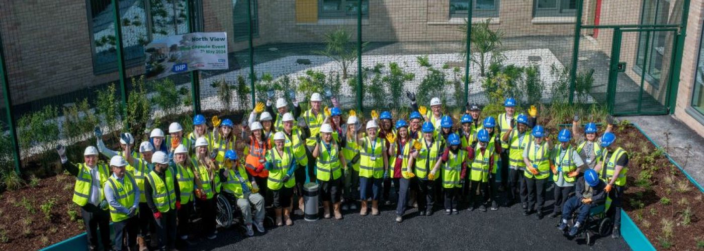 Historic moment for Manchester as time capsule is buried at brand-new mental health unit construction site