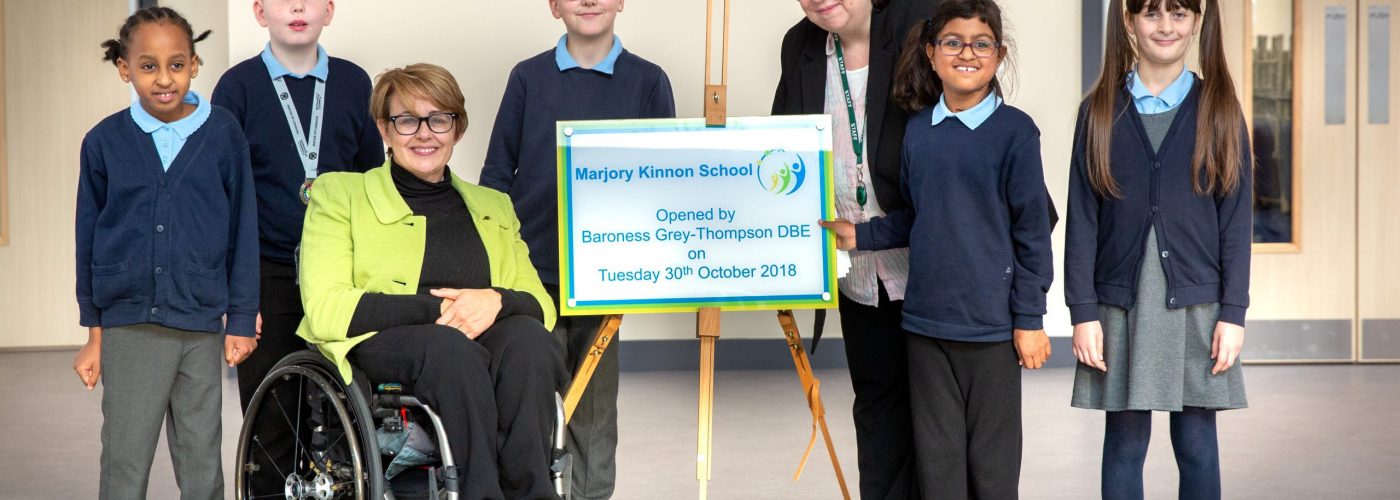 Baroness-Grey-Thompson-with-headteacher-Tracy-Meredith-and-children-from-the-giraffe-class-in-upper-primary
