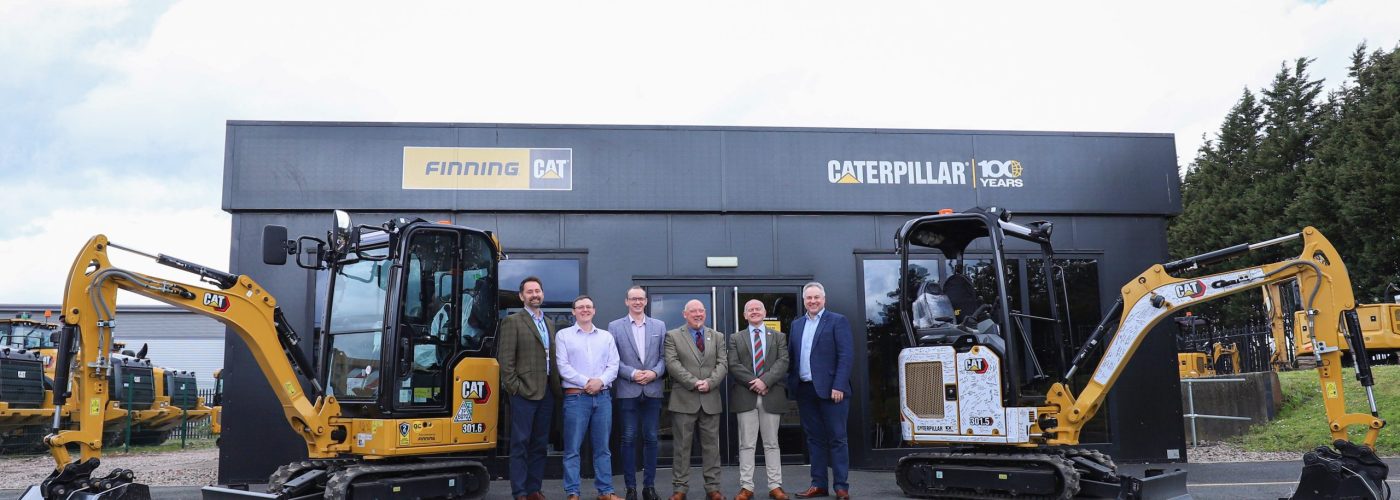 Lucky winners of Finning giveaway collect excavator prizes