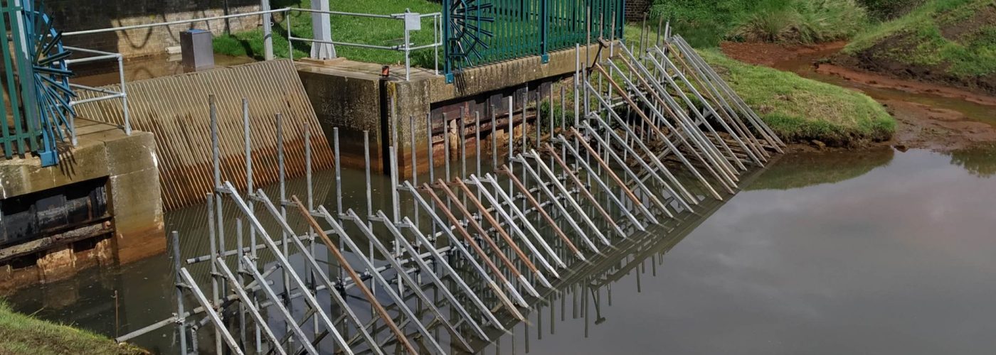 The framework ready for the installation of the fabric membrane that forms the dam