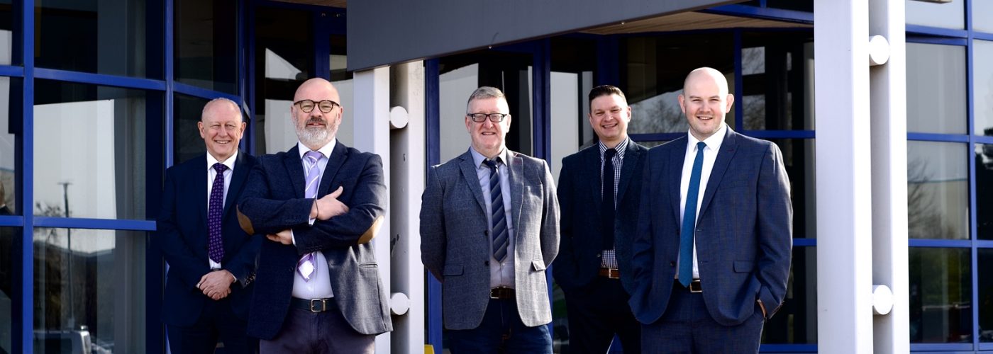 showing (left to right) Harris CM’s managing director Neil Silcock, CEO Jason Adlam, commercial director Jason Collins, construction director James Philips and finance director Rhys Davies.