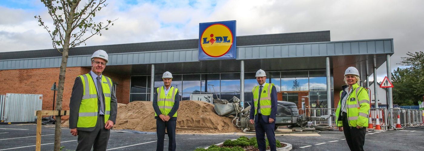 Image:Dawn McNamara Photography - Mark Robson, Leader, Hambleton District Council; Frank Kofler, Managing Director, Castlehouse Construction; Jonathan Stubbs, Development Director, Wykeland Group and Gemma Lennon, Head of Marketing, Castlehouse Construction pictured outside Lidl, the retail anchor for the £17M scheme.